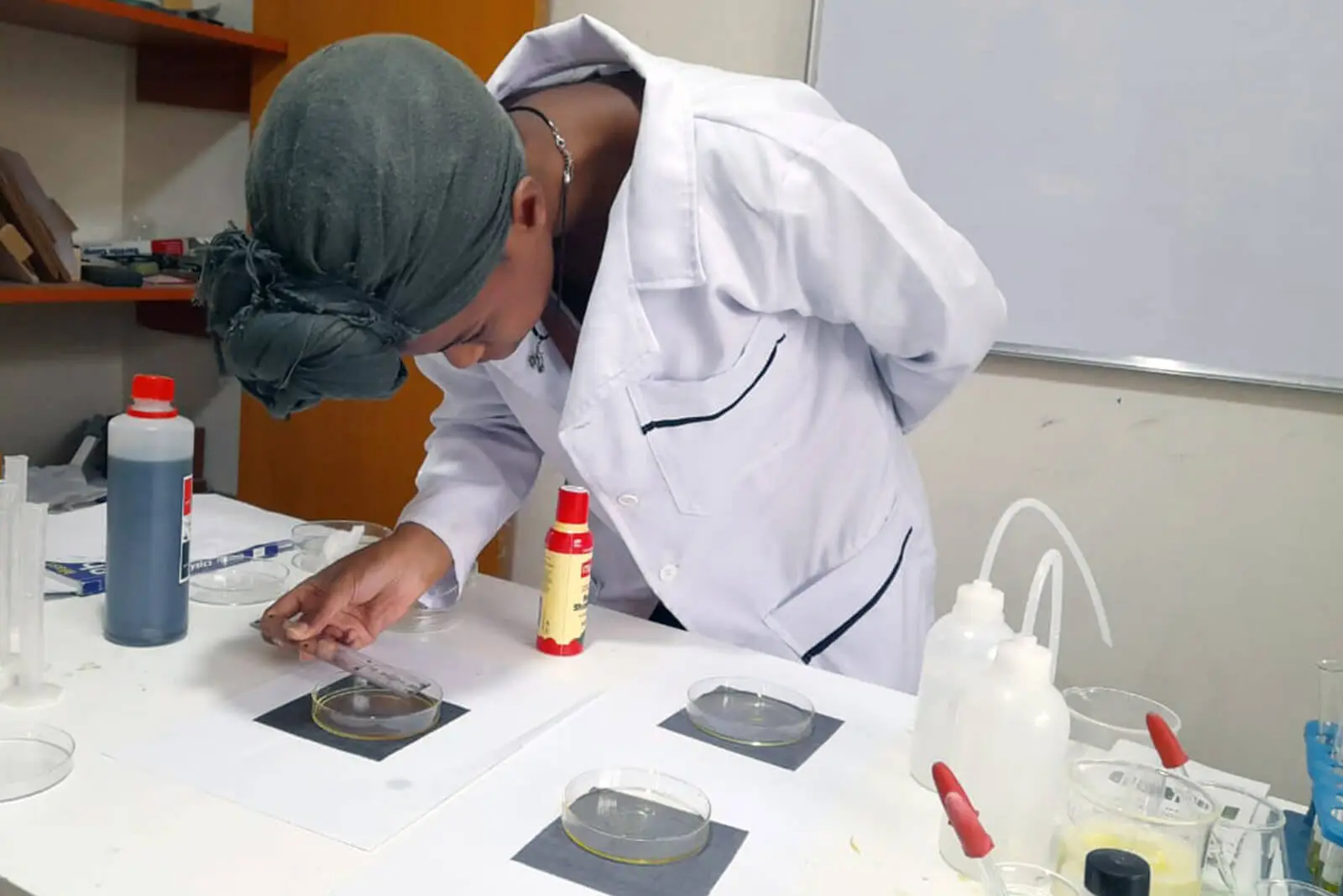 ALC Student performing science experiments